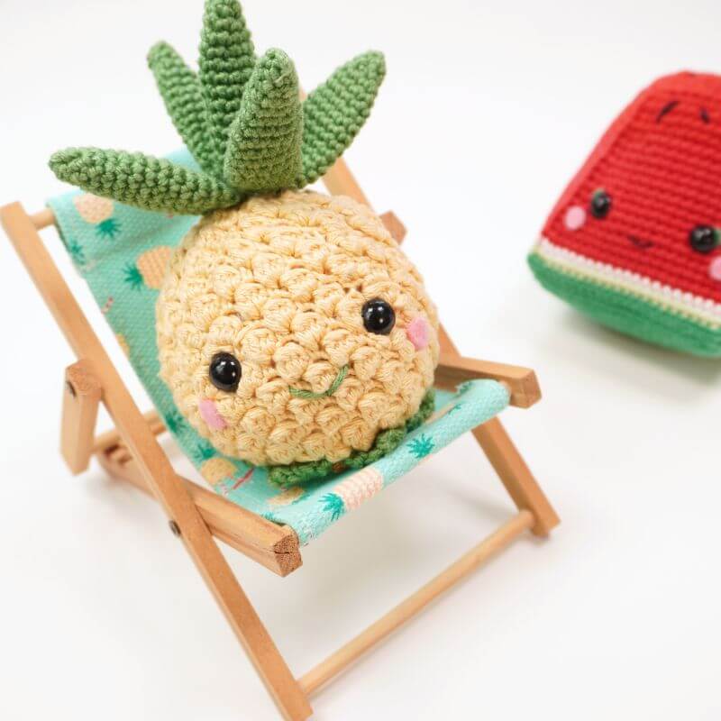 crochet pineapple on a hammock and an amigurumi watermelon